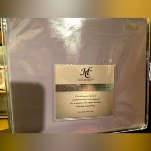New in package-never opened platinum collection full size sheet set.